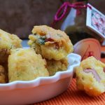 Frittelle con mortadella, aceto balsamico tradizionale e pistacchi/ Fritters with bologna, balsamic vinegar and pistachios.