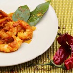 Chingri maach, gamberi al curry/ Chingri maach, curry prawns.
