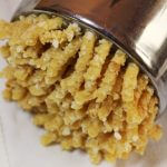 Passatelli romagnoli in brodo/ Passatelli in brodo, typical first course from Romagna.