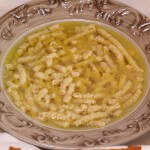 Passatelli romagnoli in brodo/ Passatelli in brodo, typical first course from Romagna.