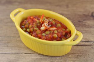 Cuttlefish and peas with tomato sauce.