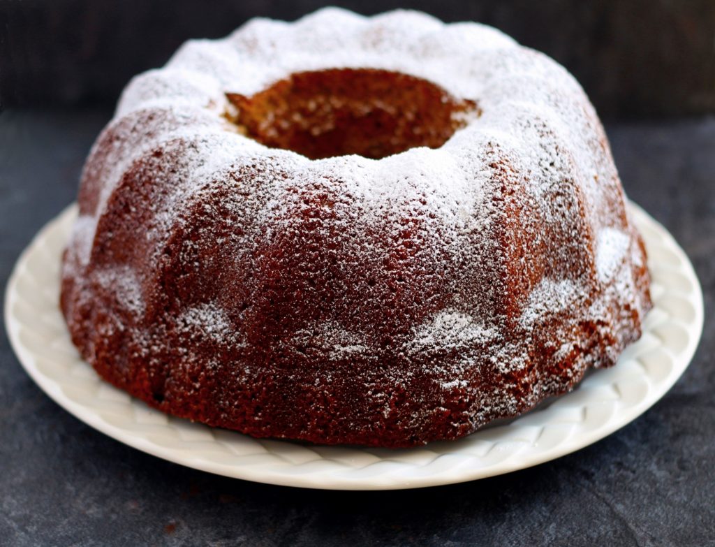 Muscovado bundt cake with hazelnut meal and orange juice.