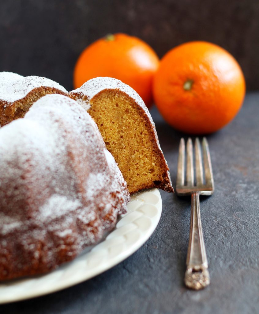 Muscovado bundt cake with hazelnut meal and orange juice.