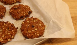 Anzac cookies, recipe from Yotam Ottolenghi with coconut, oat and raisin.